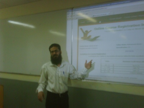 Usman Nagi conducting training session for faculty and advisors on OCRIS